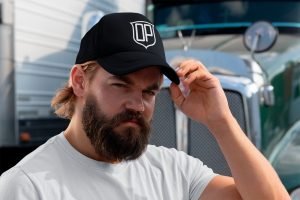 mockup-of-a-bearded-man-with-a-trucker-hat-standing-next-to-a-truck-29488 (4)